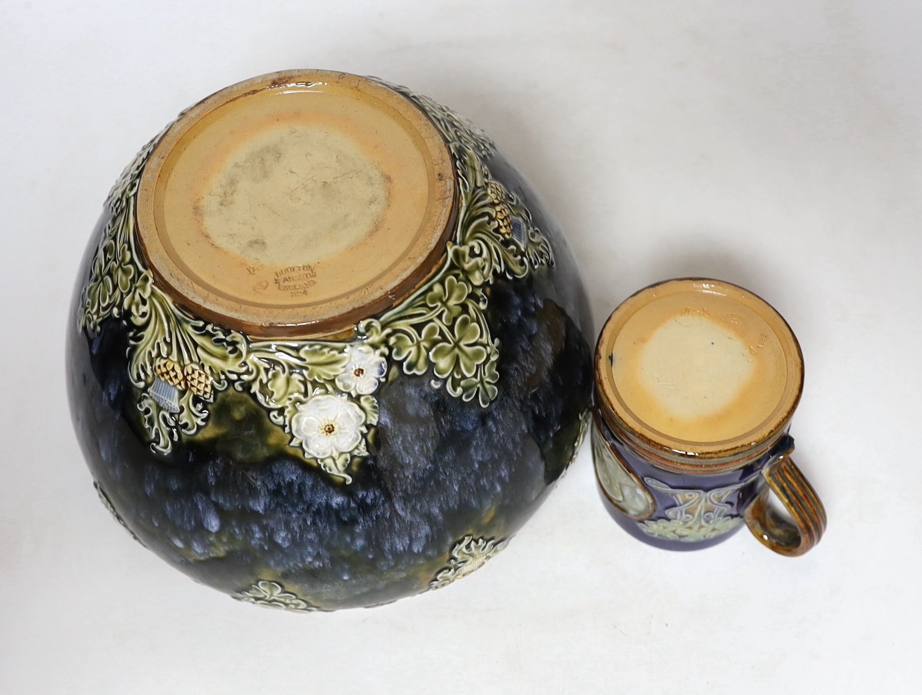 A Royal Doulton Lambeth Edward VII coronation mug and a Royal Doulton jardiniere, 18cm (2)